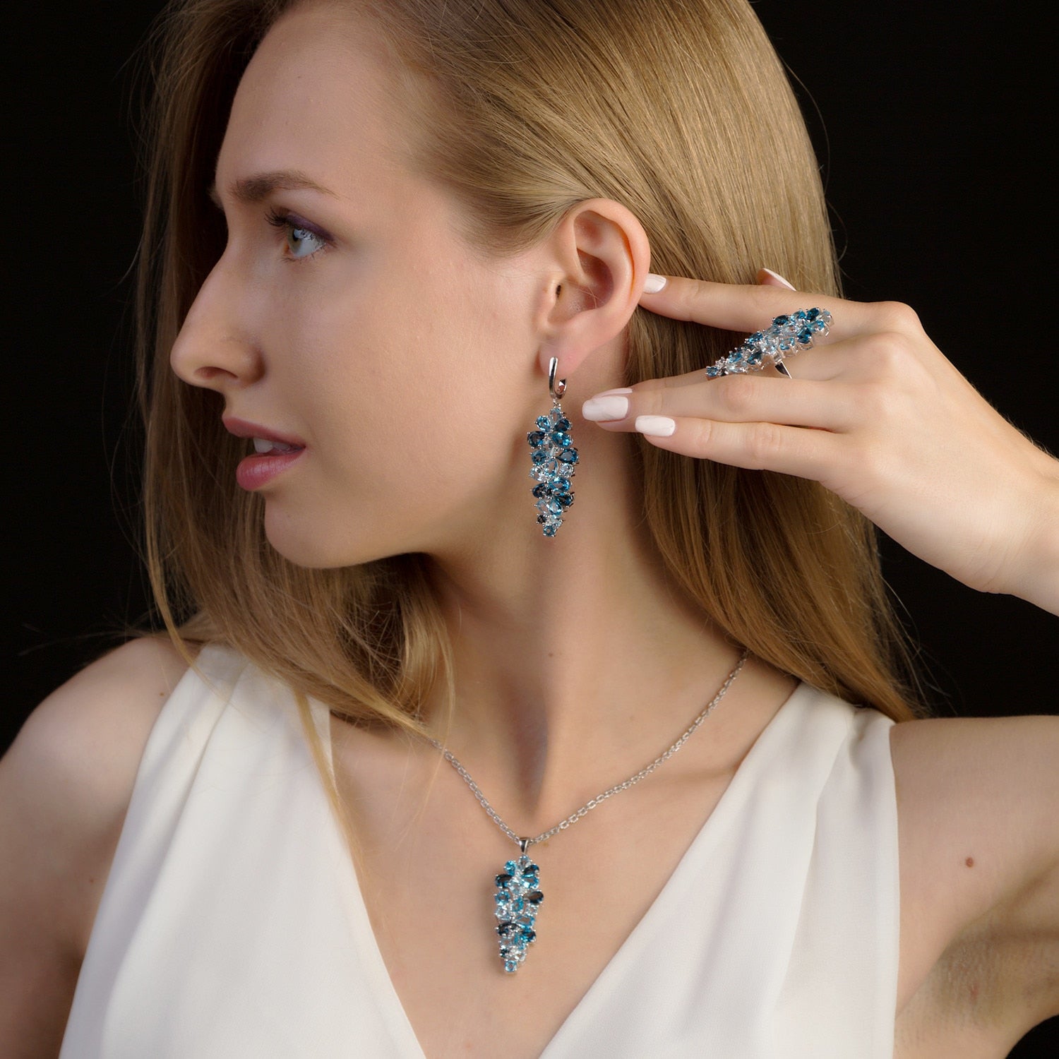 An 18ct White Gold set of Blue Topaz and Diamond Earrings and Necklace –  The Jewel Box Gibraltar